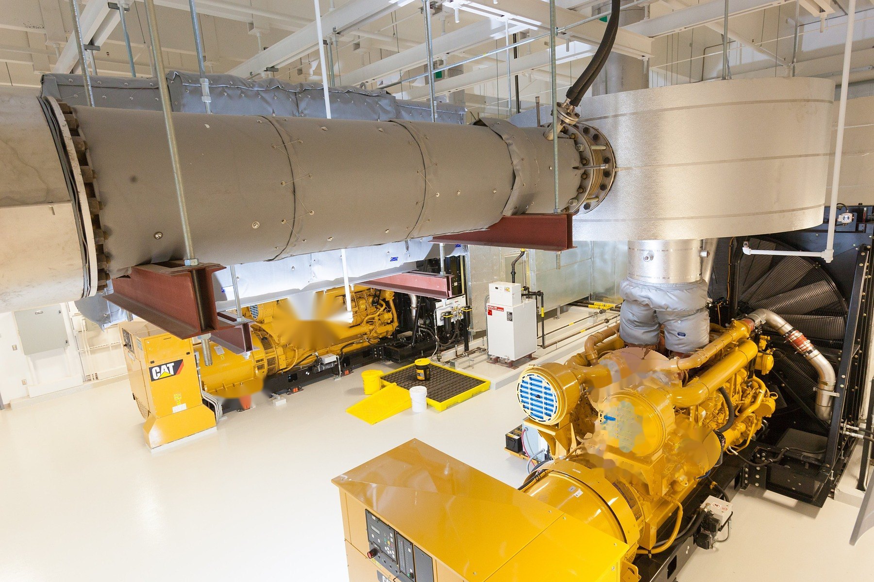 Insulated exhaust run serving multiple generator sets
